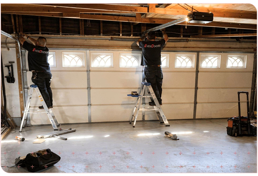 Everdoors-Garage-Door-Workers-Fixing-A-Garage-Door-On-The-Inside (3)