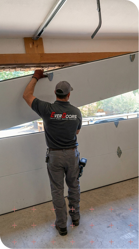 Everdoors-worker-working-on-a-garage-door