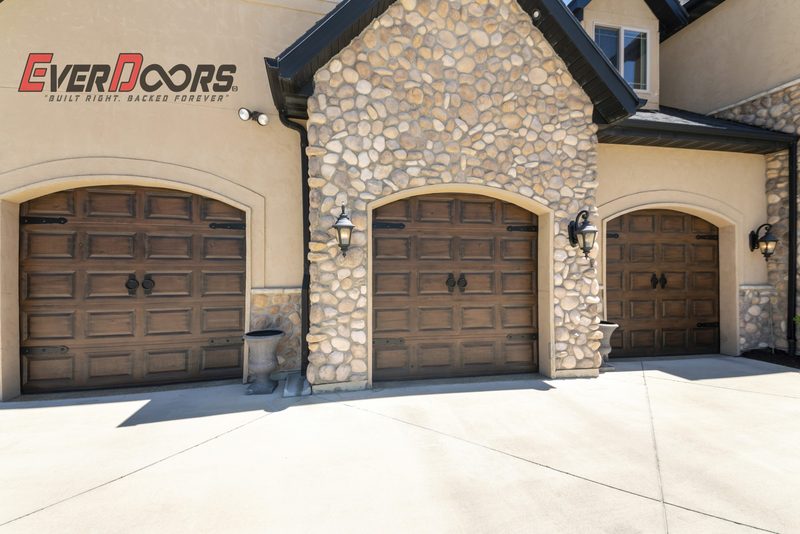 Arched carriage trio: a garage door installed by Everdoors